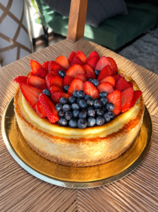 Cheesecake Arándanos/Frutillas frescas en base de mermelada de frambuesa artesanal